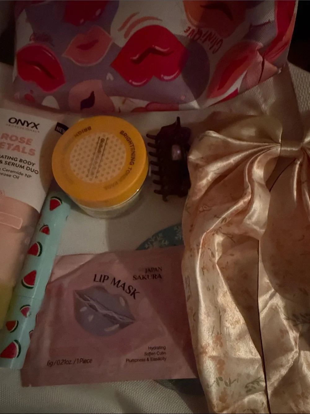 Pink Lip Mask Sheet & Pink Kiss Print Cosmetic Pouch filled etc